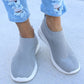 White Slip-On Sneakers