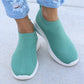 White Slip-On Sneakers